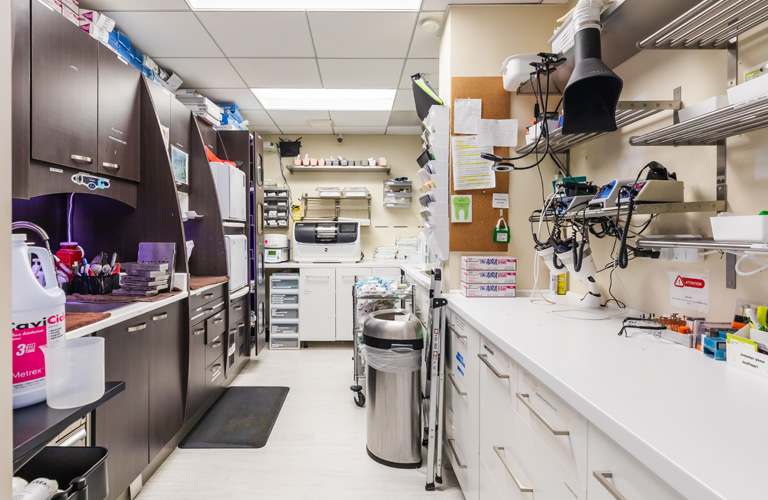 a kitchen with a lot of cabinets and a lot of appliances  at RTC Dental in Chantilly for Pediatric dentist Reston services.