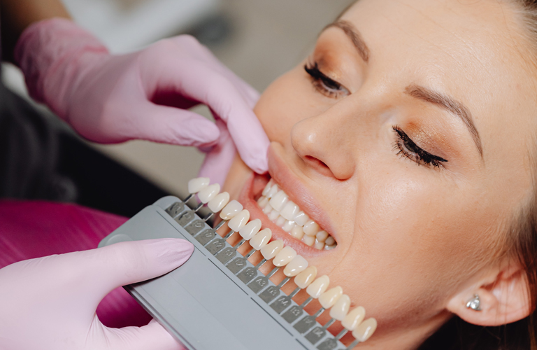 woman with mouth open in dentist chair at RTC Dental in Reston, VA for Emergency dentist Reston services.