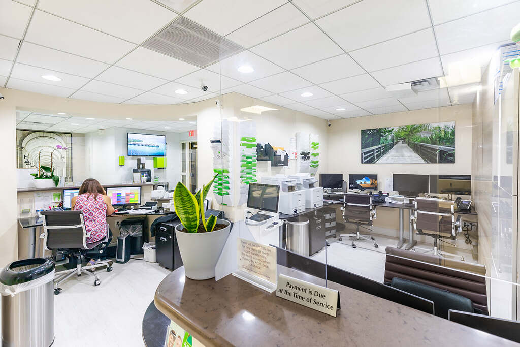 a large room with a large table and a large window  at RTC Dental in Oakton for Dental implants Reston services.