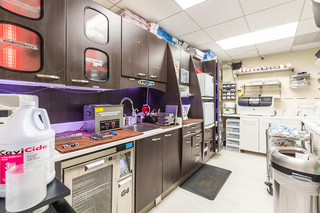 a kitchen with a large counter top and a large refrigerator  at RTC Dental in McLean for Invisalign Reston services.