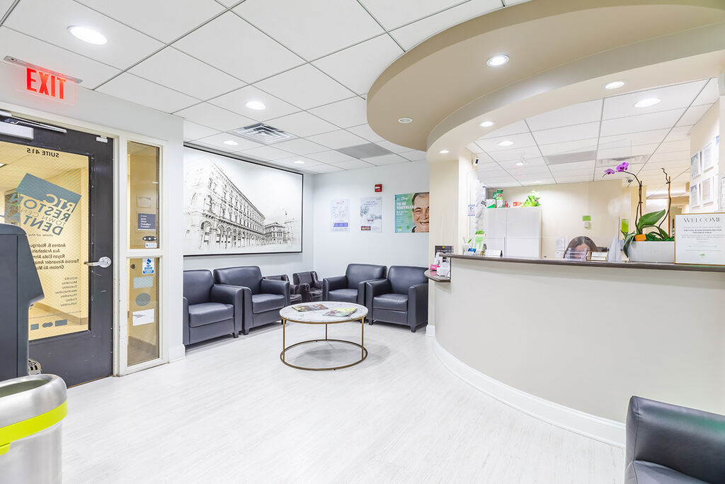 a large room with a large couch and chairs  at RTC Dental in Ashburn for RTC Dental Reston services.